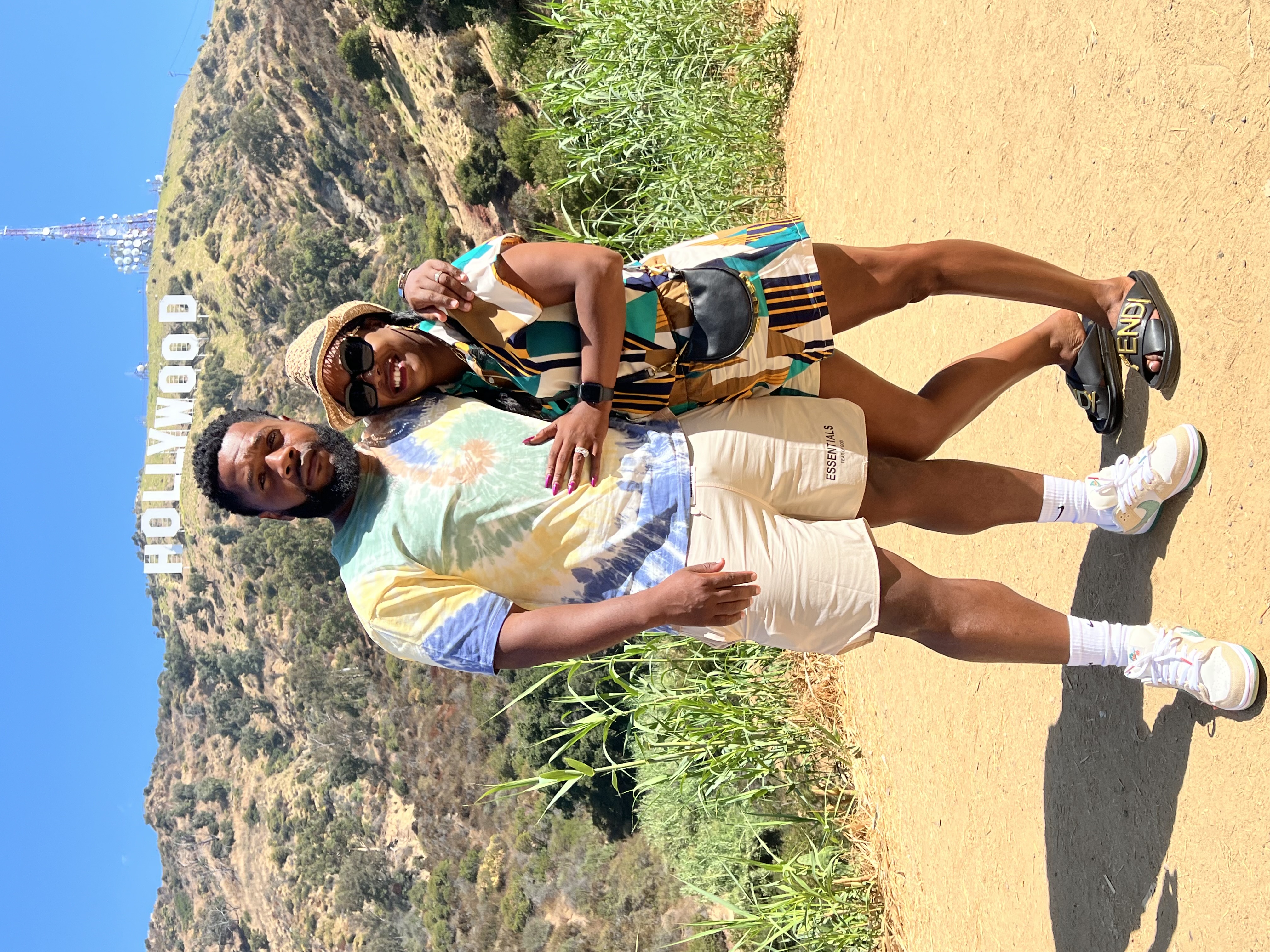 The Newkirks together beneath the Hollywood sign